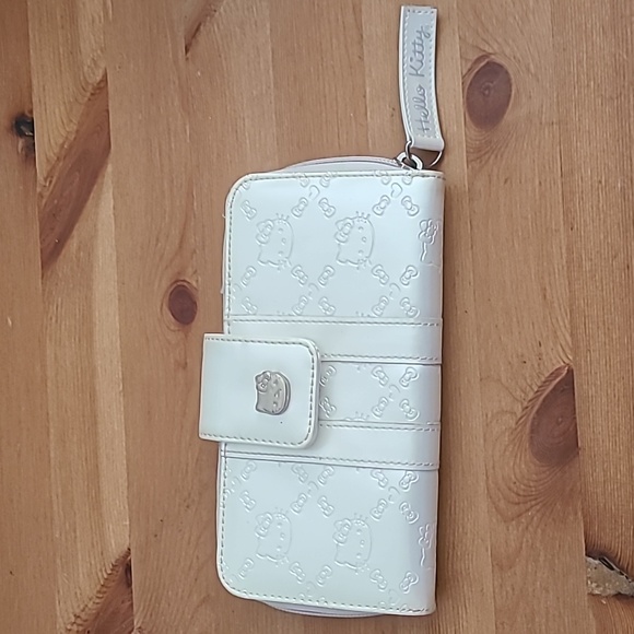 Loungefly Handbags - Hello Kitty wallet in pearl white